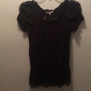 Laced top with camisole. Elastic tie waist.